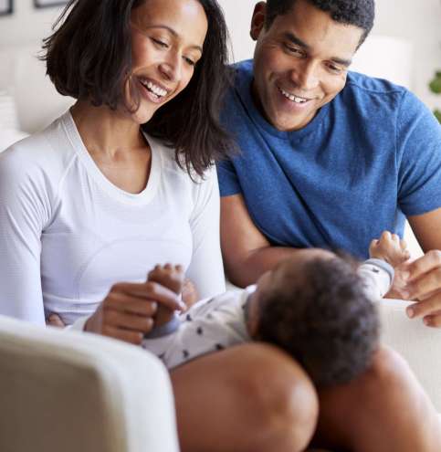 happy-young-mixed-race-parents-spending-time-with-2026-03-10-03-19-51-utc